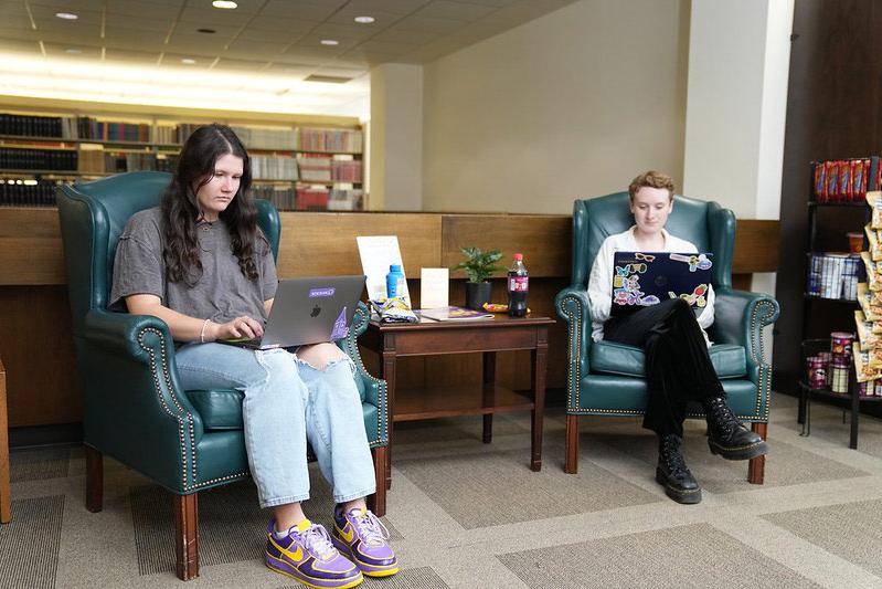 Students study in the library cafe